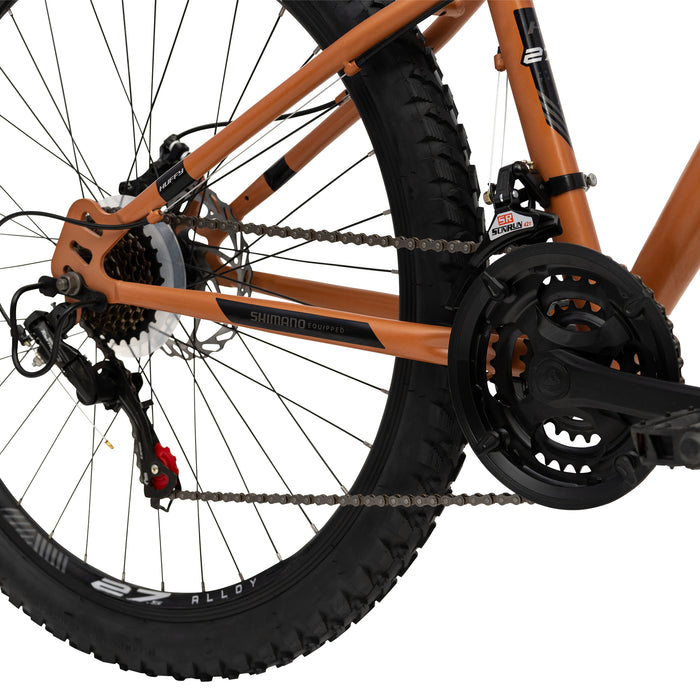Huffy Korros 27.5" – Hardtail MTB med 21 Shimano-växlar & X-Frame (Bronze)