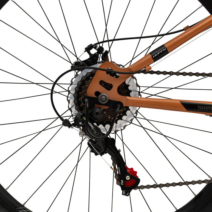 Huffy Korros 27.5" – Hardtail MTB med 21 Shimano-växlar & X-Frame (Bronze)