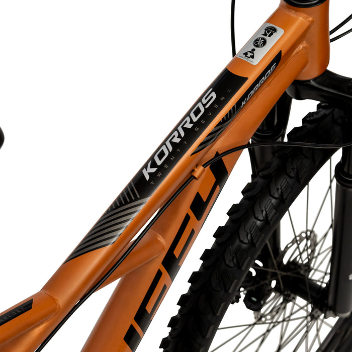 Huffy Korros 27.5" – Hardtail MTB med 21 Shimano-växlar & X-Frame (Bronze)
